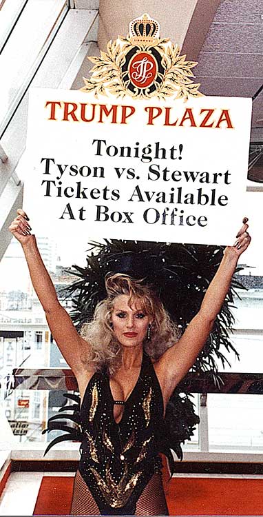 a female employee at Trump Plaza holding a 'round card' designed by Norman Dee Associates that reads 'Tonight! Tyson vs. Stewart Tickets Available At Box Office'